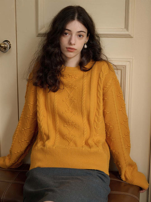 Leah 純色絞花落肩毛衣